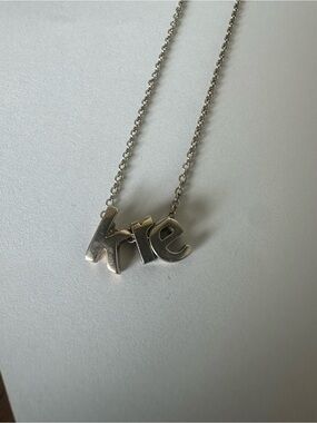 Gold  'Kre' Letter Pendant Necklace